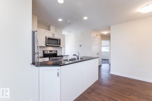 #81 1530 Tamarack Bv Nw, Edmonton, AB - Indoor Photo Showing Kitchen With Double Sink