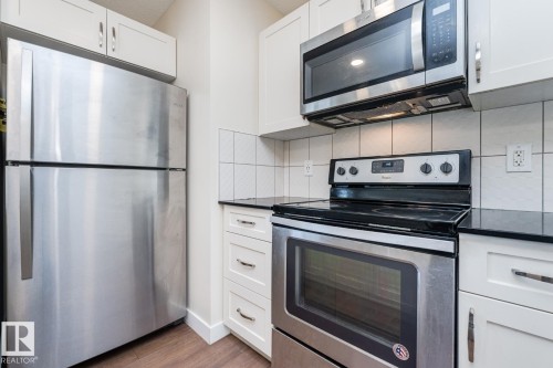 #81 1530 Tamarack Bv Nw, Edmonton, AB - Indoor Photo Showing Kitchen With Stainless Steel Kitchen
