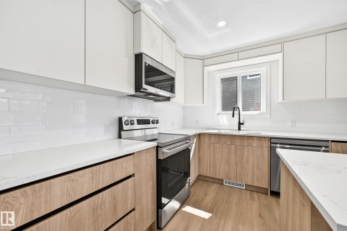 17816 94 Street Nw, Edmonton, AB - Indoor Photo Showing Kitchen With Upgraded Kitchen