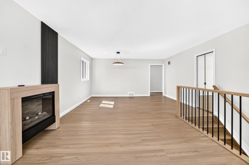 17816 94 Street Nw, Edmonton, AB - Indoor Photo Showing Other Room With Fireplace