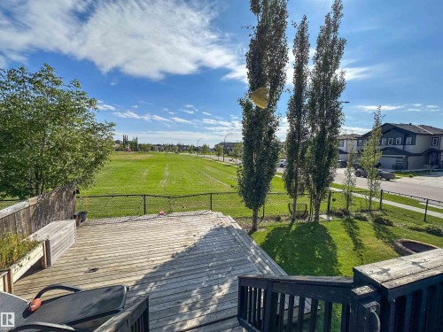 Expansive outdoor deck with built-in planters and fencing - 6515 37 Avenue, Beaumont, AB - Outdoor With View