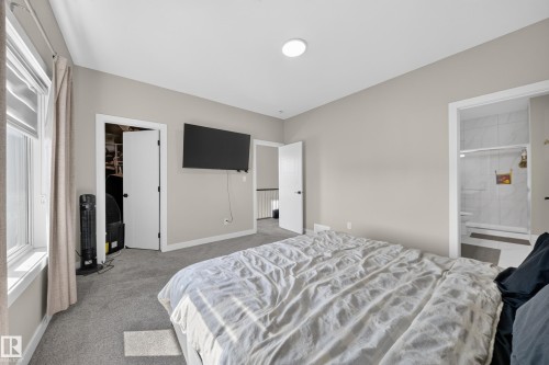 Recessed ceiling lighting, light gray walls, gray carpet flooring, white trim, and a white interior door - 4301 38 St, Beaumont, AB - Indoor Photo Showing Bathroom