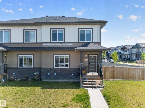 Two-story exterior with multi-toned siding and stone accents - 4301 38 St, Beaumont, AB - Outdoor