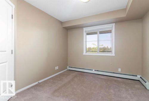 #421 3315 James Mowatt Tr Sw, Edmonton, AB - Indoor Photo Showing Other Room