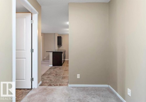 #421 3315 James Mowatt Tr Sw, Edmonton, AB - Indoor Photo Showing Other Room