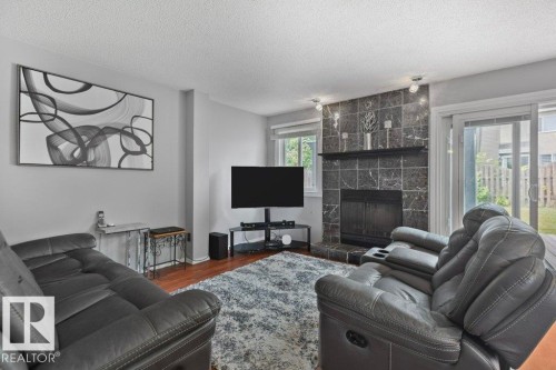 6010 173 Street Nw, Edmonton, AB - Indoor Photo Showing Living Room With Fireplace