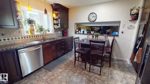 76 Gariepy Crescent Nw, Edmonton, AB - Indoor Photo Showing Kitchen With Double Sink