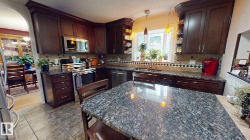 76 Gariepy Crescent Nw, Edmonton, AB - Indoor Photo Showing Kitchen With Double Sink