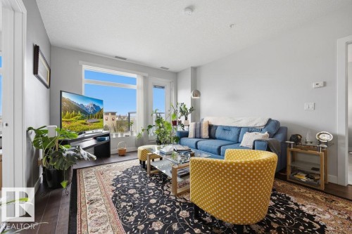 #433 5151 Windermere Bv Sw, Edmonton, AB - Indoor Photo Showing Living Room