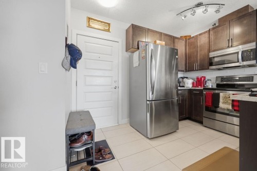 #433 5151 Windermere Bv Sw, Edmonton, AB - Indoor Photo Showing Kitchen