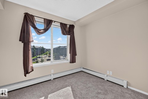 #417 12045 22 Av Sw, Edmonton, AB - Indoor Photo Showing Other Room