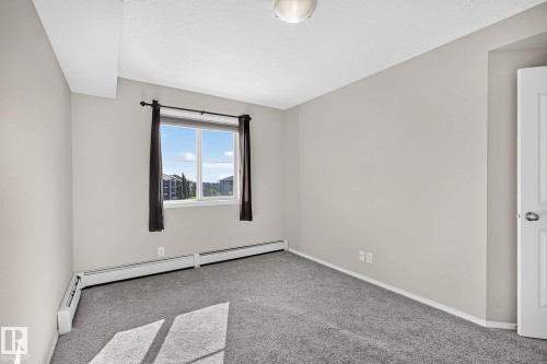#417 12045 22 Av Sw, Edmonton, AB - Indoor Photo Showing Other Room
