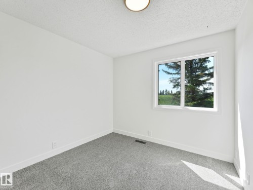 #10 13833 30 St Nw, Edmonton, AB - Indoor Photo Showing Other Room