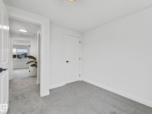 #10 13833 30 St Nw, Edmonton, AB - Indoor Photo Showing Other Room