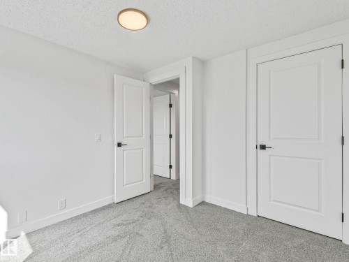 #10 13833 30 St Nw, Edmonton, AB - Indoor Photo Showing Other Room
