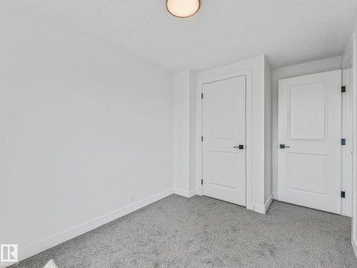 #10 13833 30 St Nw, Edmonton, AB - Indoor Photo Showing Other Room