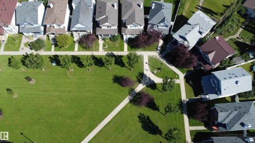 Expansive green space with mature trees and paved walking paths - 4121 Tompkins Way Nw, Edmonton, AB -  With View