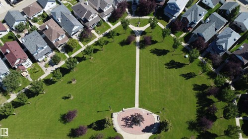 Aerial perspective showcasing community park with walking paths and surrounding residences - 4121 Tompkins Way Nw, Edmonton, AB - 