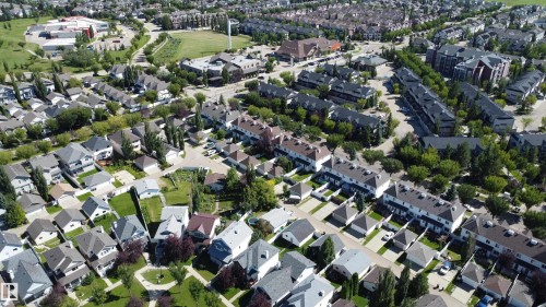 Expansive residential area featuring a mix of single-family homes and multi-unit dwellings - 4121 Tompkins Way Nw, Edmonton, AB - Outdoor With View