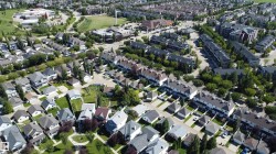 Expansive residential area featuring a mix of single-family homes and multi-unit dwellings - 