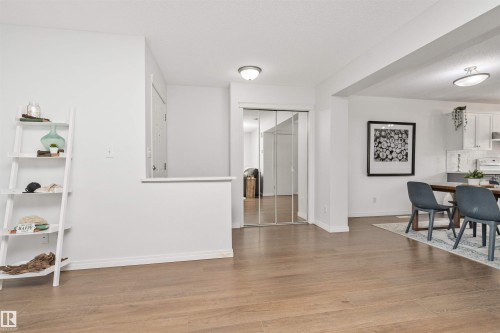 Vinyl flooring, white walls, and ample dining room space - 4121 Tompkins Way Nw, Edmonton, AB - Indoor