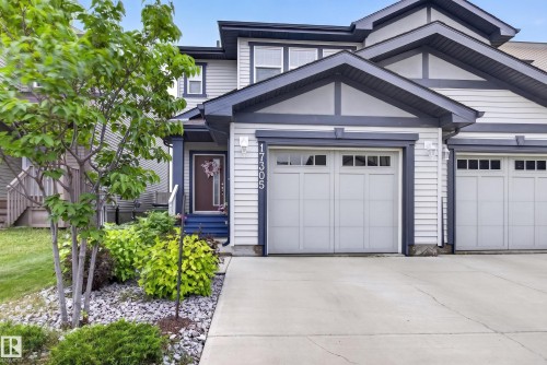 Contemporary multi-level exterior featuring light-toned siding and dark trim accents - 17305 73 Street Nw, Edmonton, AB - Outdoor