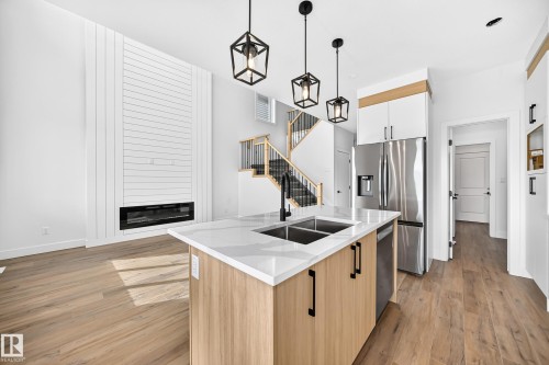 77 Elliott Wynd, Fort Saskatchewan, AB - Indoor Photo Showing Kitchen With Double Sink With Upgraded Kitchen