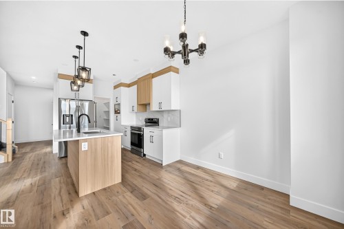 77 Elliott Wynd, Fort Saskatchewan, AB - Indoor Photo Showing Kitchen With Upgraded Kitchen