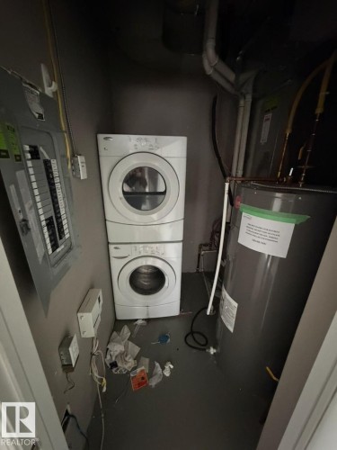 #21 6520 2 Av Sw, Edmonton, AB - Indoor Photo Showing Laundry Room