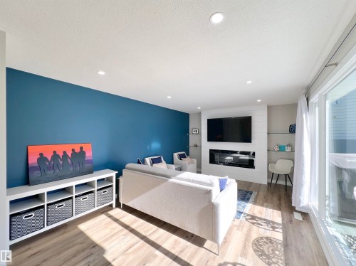 4235 147 Street Nw, Edmonton, AB - Indoor Photo Showing Living Room With Fireplace
