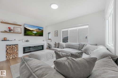 318 Jensen Lakes Boulevard, St. Albert, AB - Indoor Photo Showing Living Room With Fireplace