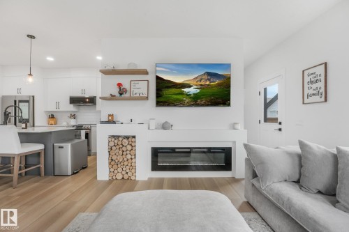 318 Jensen Lakes Boulevard, St. Albert, AB - Indoor Photo Showing Living Room With Fireplace