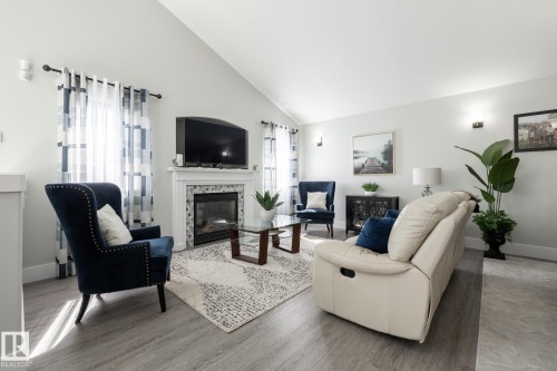 8919 176 Avenue Nw, Edmonton, AB - Indoor Photo Showing Living Room With Fireplace