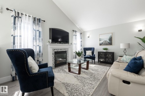 8919 176 Avenue Nw, Edmonton, AB - Indoor Photo Showing Living Room With Fireplace