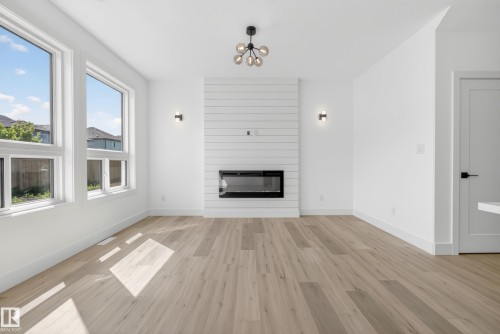 117 Caledon Crescent, Spruce Grove, AB - Indoor Photo Showing Living Room With Fireplace