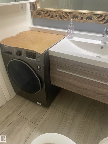 #208 9810 178 St Nw, Edmonton, AB - Indoor Photo Showing Laundry Room