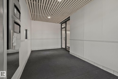 Secure, locked lobby and building entrance - #1408 10125 109 St Nw, Edmonton, AB - Indoor Photo Showing Other Room