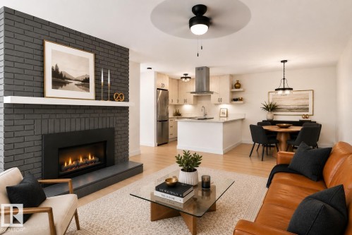 #1408 10125 109 St Nw, Edmonton, AB - Indoor Photo Showing Living Room With Fireplace