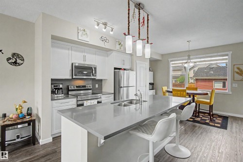 2234 Glenridding Boulevard Sw, Edmonton, AB - Indoor Photo Showing Kitchen With Stainless Steel Kitchen With Double Sink With Upgraded Kitchen