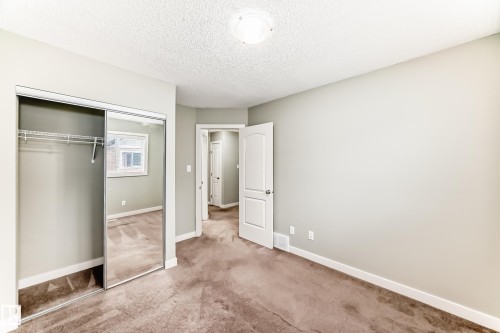 #47 12004 22 Av Sw, Edmonton, AB - Indoor Photo Showing Other Room