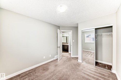 #47 12004 22 Av Sw, Edmonton, AB - Indoor Photo Showing Other Room