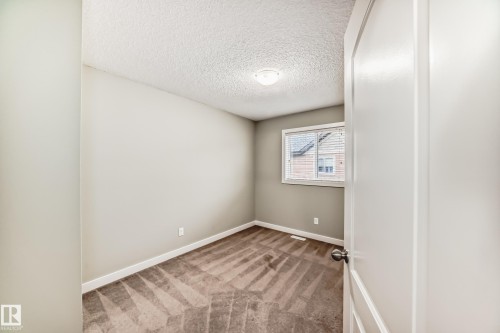 #47 12004 22 Av Sw, Edmonton, AB - Indoor Photo Showing Other Room