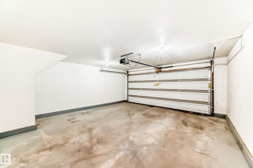 #47 12004 22 Av Sw, Edmonton, AB - Indoor Photo Showing Garage