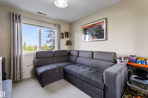 #233 279 Suder Greens Dr Nw, Edmonton, AB - Indoor Photo Showing Living Room
