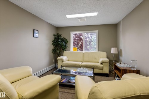 #233 279 Suder Greens Dr Nw, Edmonton, AB - Indoor Photo Showing Living Room