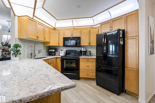 #233 279 Suder Greens Dr Nw, Edmonton, AB - Indoor Photo Showing Kitchen