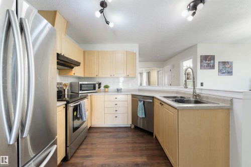 4790 Terwillegar Common Nw, Edmonton, AB - Indoor Photo Showing Kitchen With Double Sink