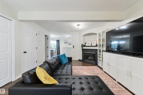 4790 Terwillegar Common Nw, Edmonton, AB - Indoor Photo Showing Living Room With Fireplace