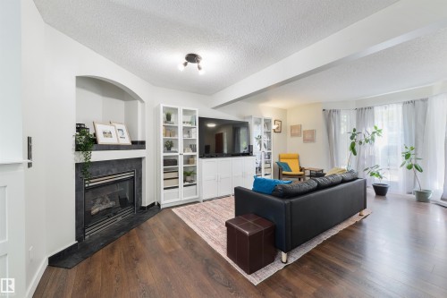 4790 Terwillegar Common Nw, Edmonton, AB - Indoor Photo Showing Living Room With Fireplace