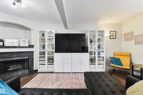 4790 Terwillegar Common Nw, Edmonton, AB - Indoor Photo Showing Living Room With Fireplace